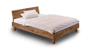 Holzmanufaktur Massivholzbett Step-X XL mit eingerückten Beinen